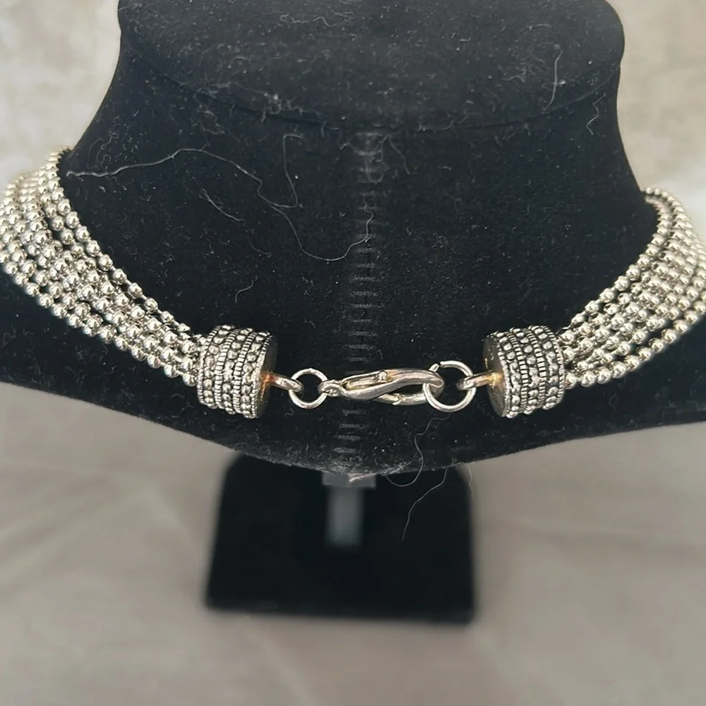 Gorgeous silver strand necklace with crystal slide